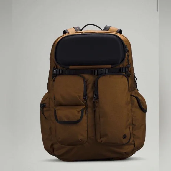 ISO Lululemon Cruiser Large Backpack 28L Deep Artifact / Gold Spice Lululemon Cruiser Backpack 23l - Artifact | Editorialist main image 2